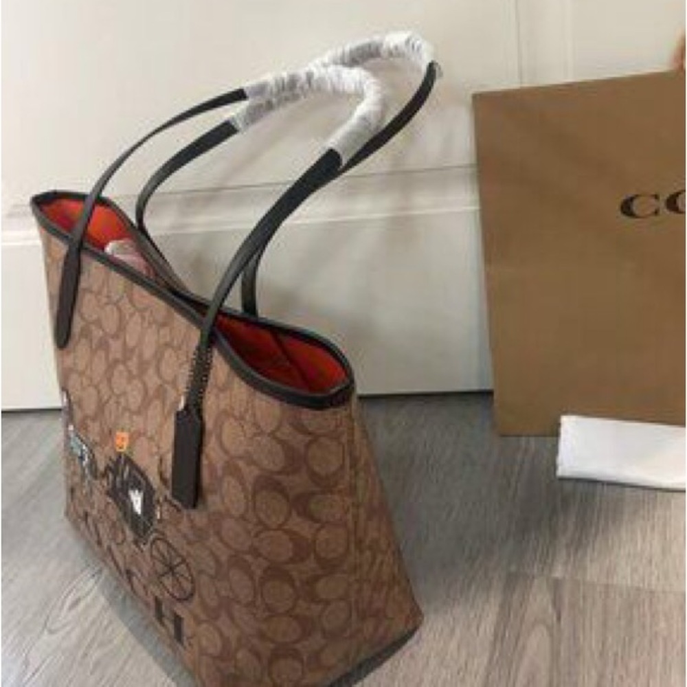 Coach Brown Signature Canvas Tote with Black Handles and Orange Interior - Picture 5 of 6